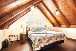 Upstairs Loft bedroom with king bed at Seahorse